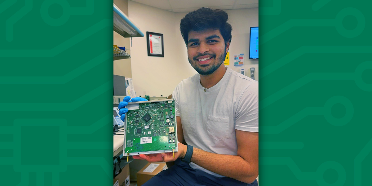 A photo of Priyansh Maheshwari holding a circuit board.