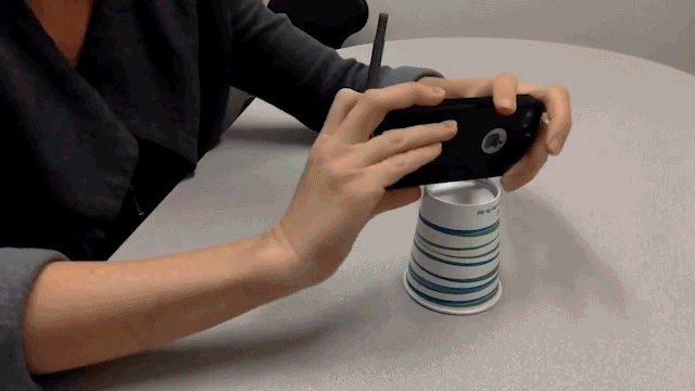 Paper cup smartphone tripod