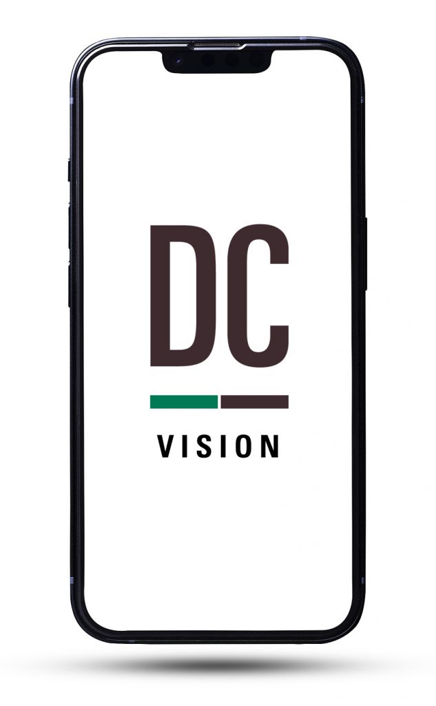 Photo of a smartphone with "DC Vision" appearing on the screen.