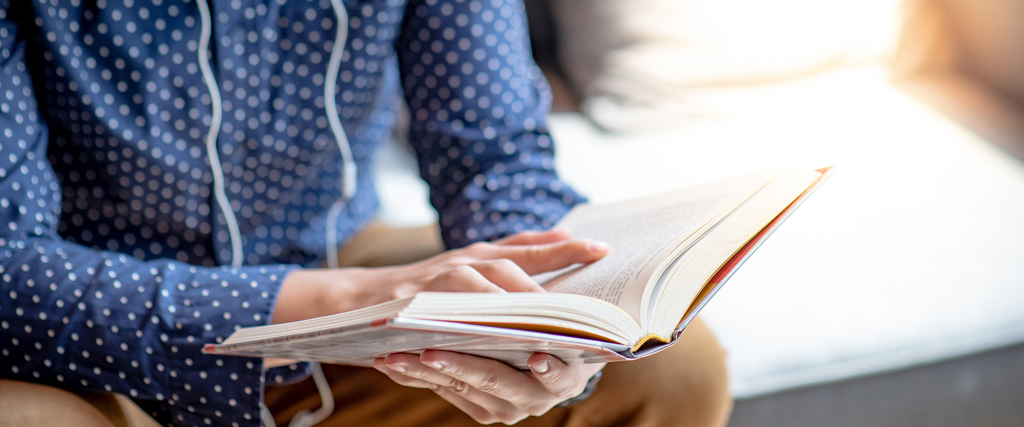 Student reading a book.