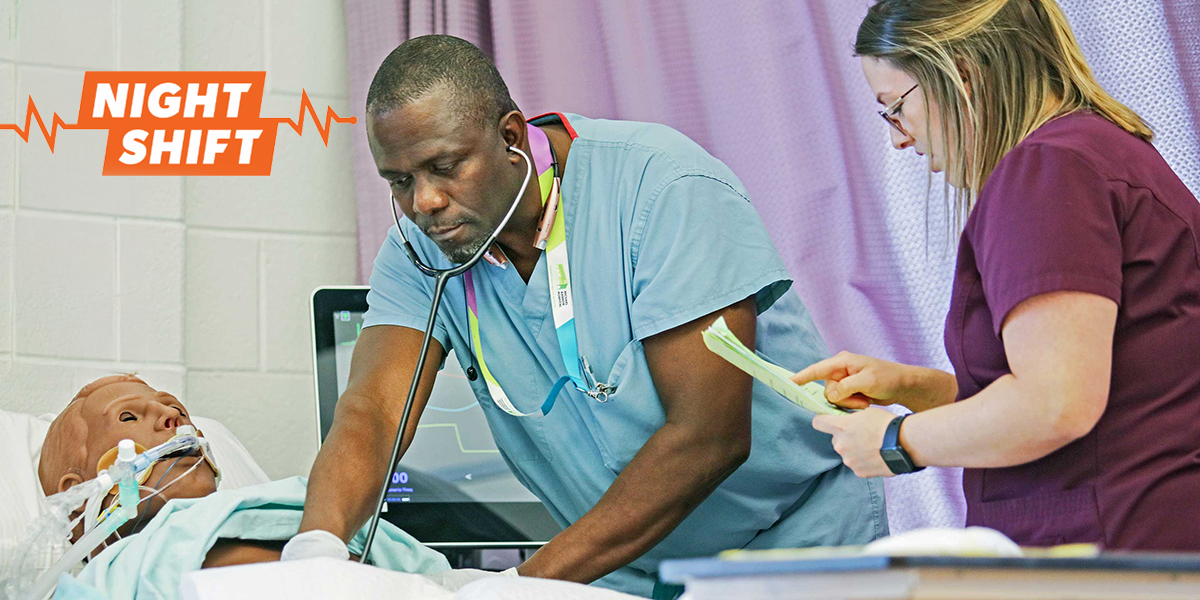 A critical care nursing student completes a simulated medical exercise.