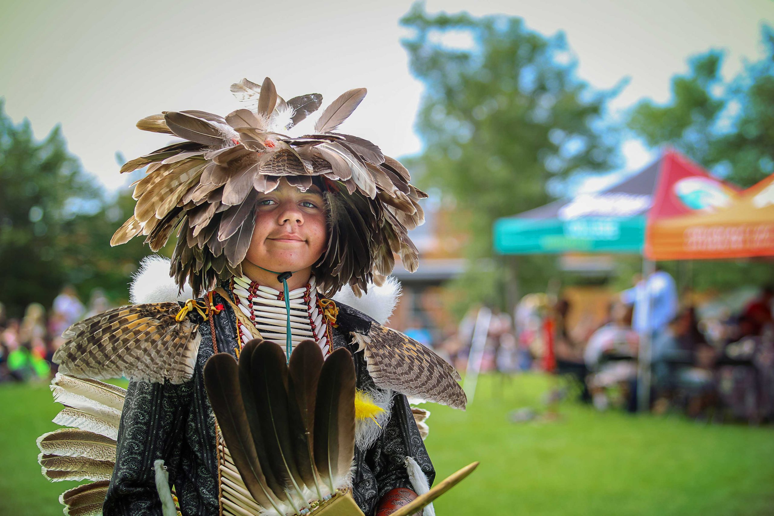 Indigenous dancer at pow wow
