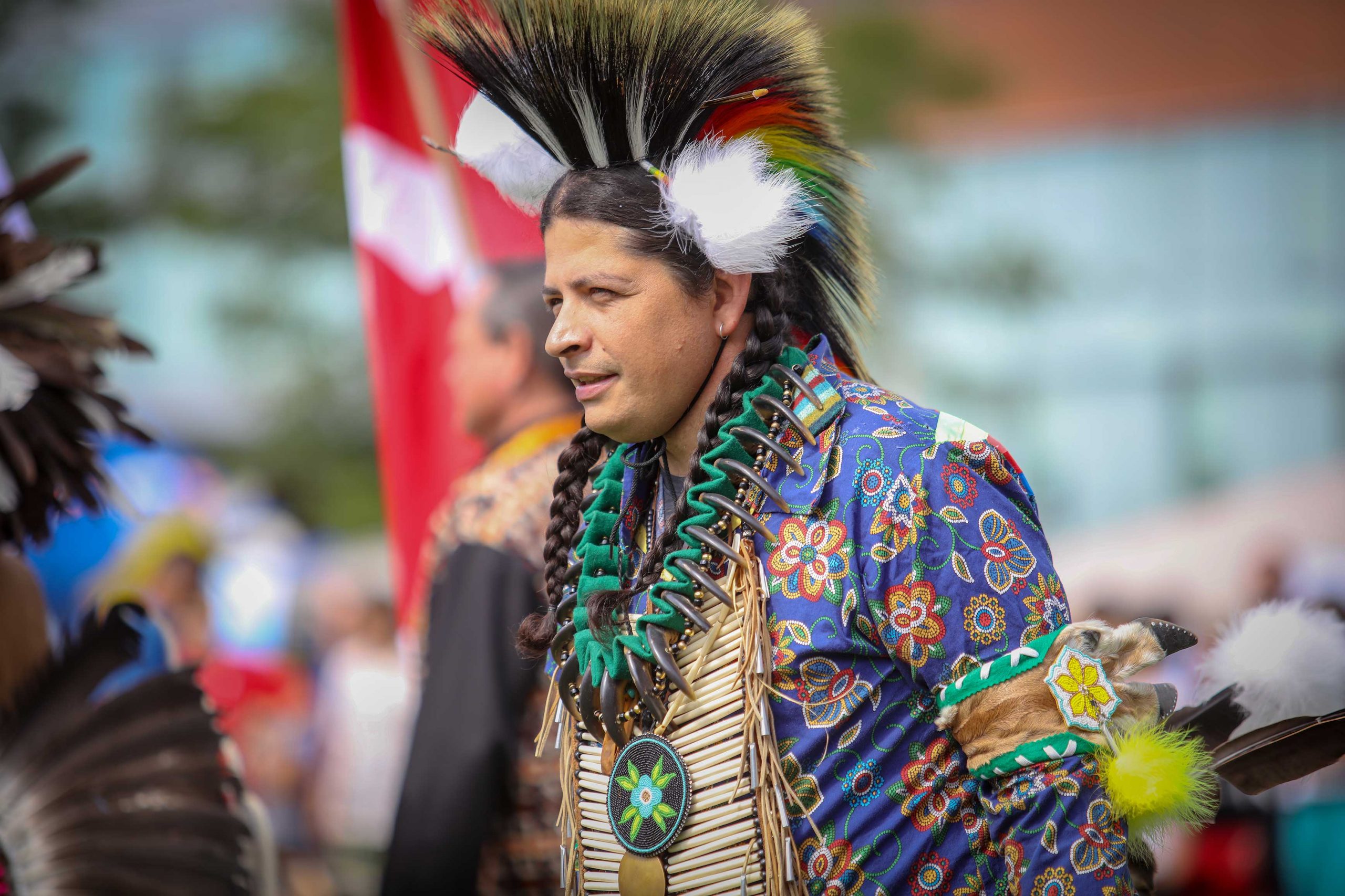 indigenous man dancing at mini pow wow on campus in 2019