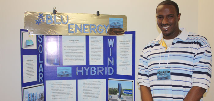 A Durham College student and his energy fair project