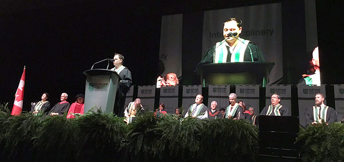 Speaker on stage at Durham College's 2016 Fall Convocation