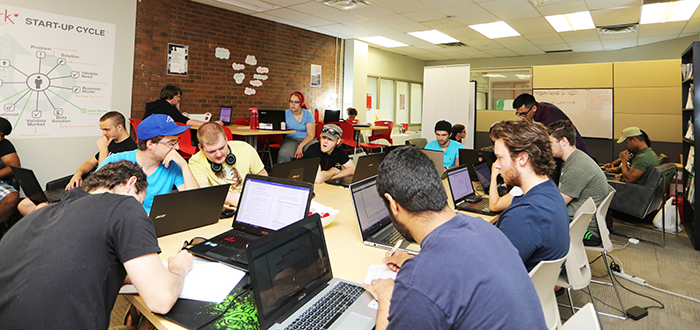 Students working at Durham College as part of the Accelerator entrepreneurship program