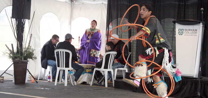 Aboriginal dancer performs at the opening of Durham College's new Aboriginal Student Centre.