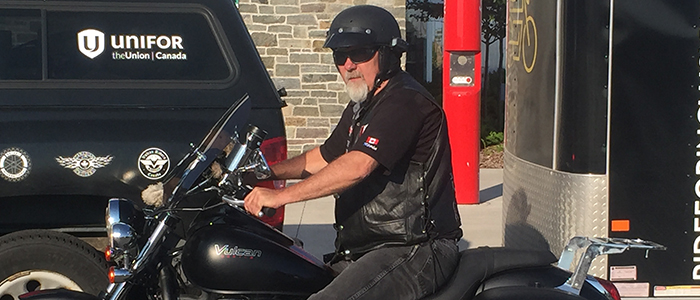 Kevin Baker prepares to begin his Ride for Inclusion journey on his motorcycle