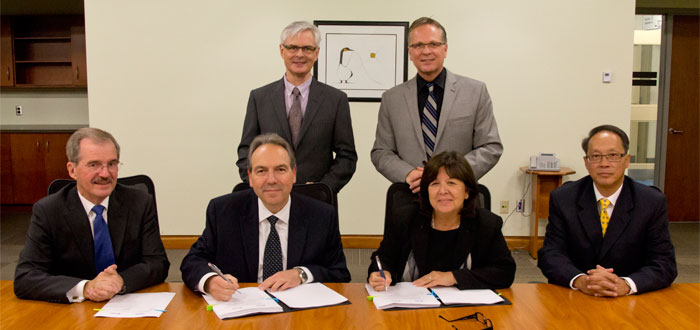 DC and UOIT articulation agreement signing