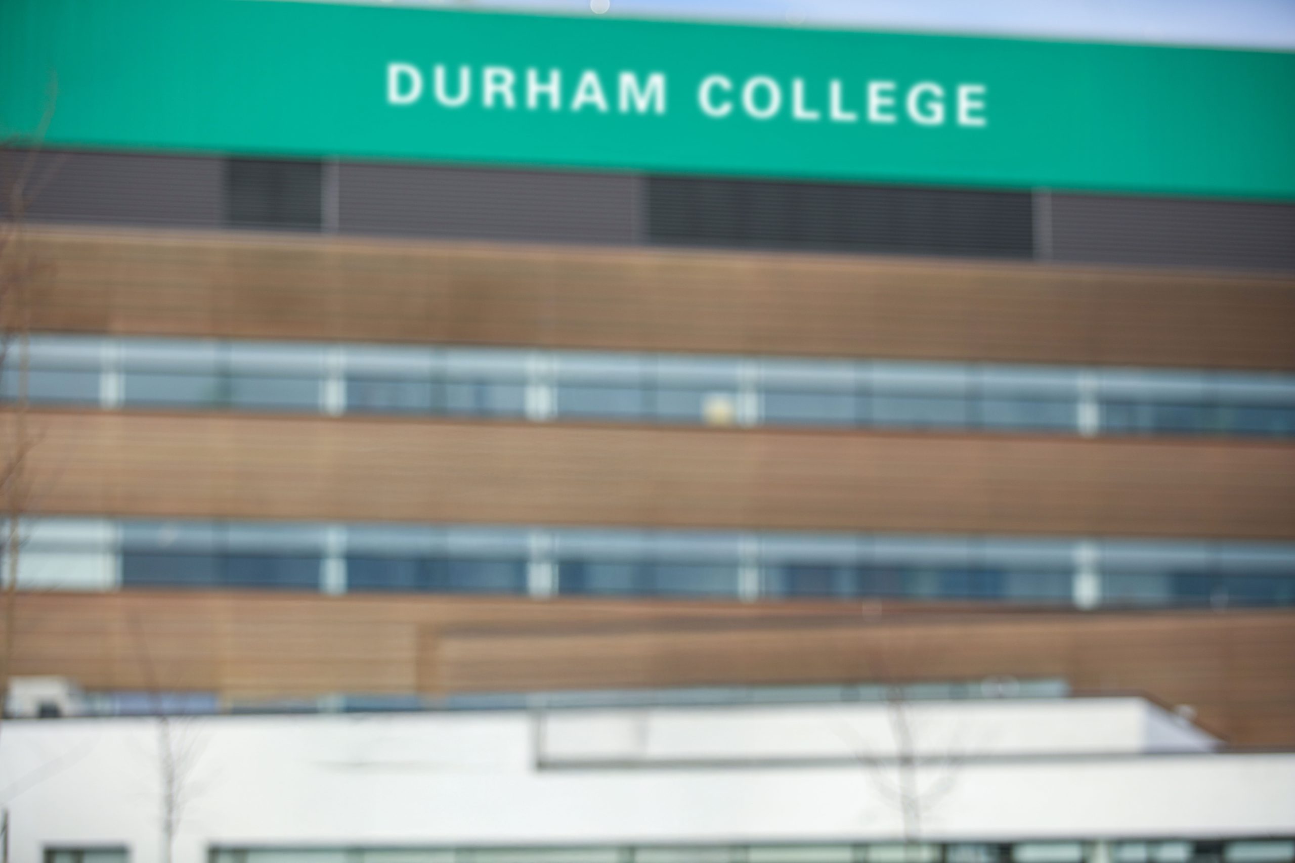 DC students conversing in DC's Student Services building.