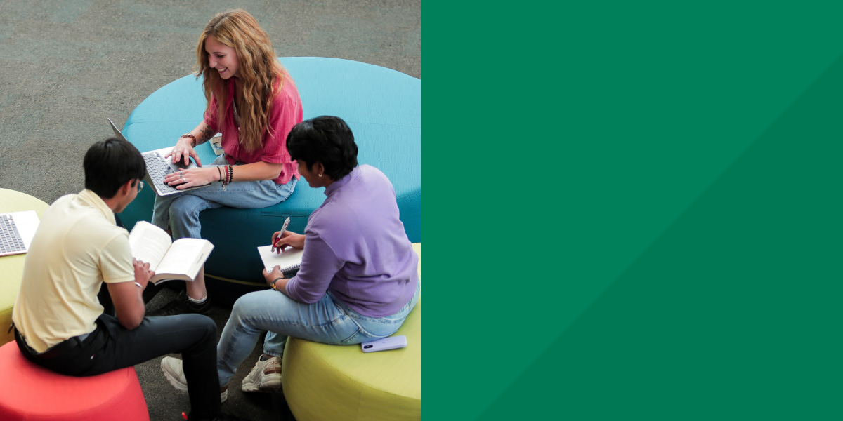 DC students conversing in DC's Student Services building.