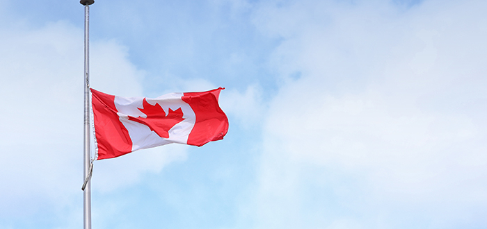 Canadian flag at half mast.