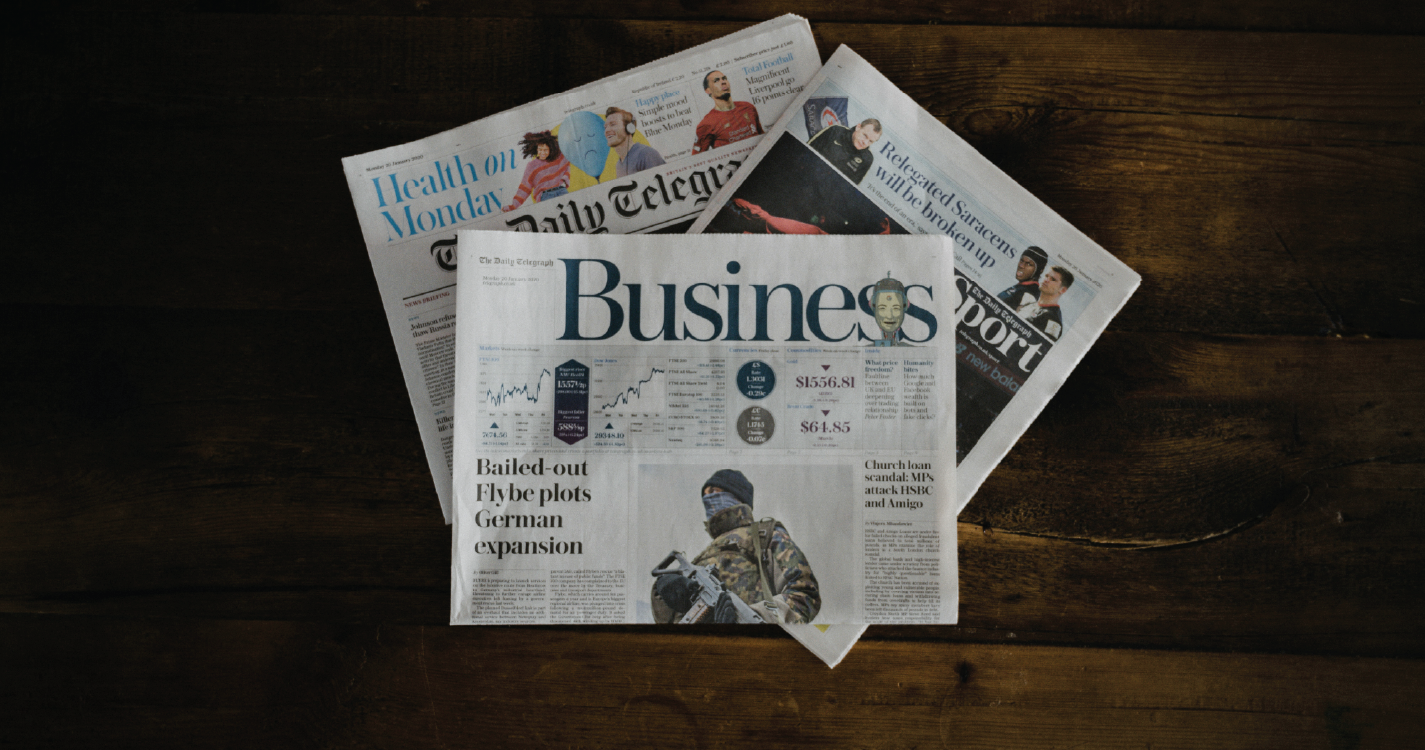 photograph of newspapers