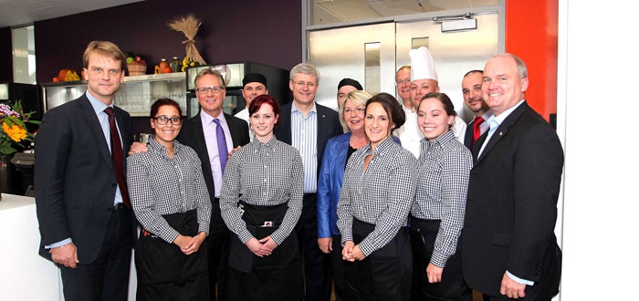 Prime Minister (PM) Stephen Harper with Bistro '67 staff