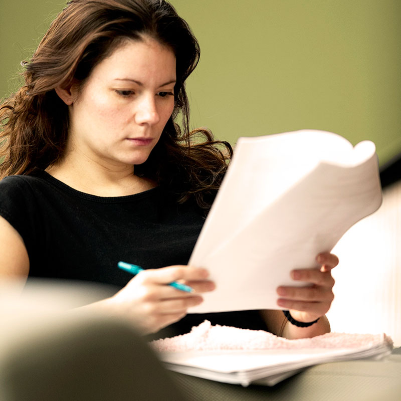 Student reviewing course schedule at DC.