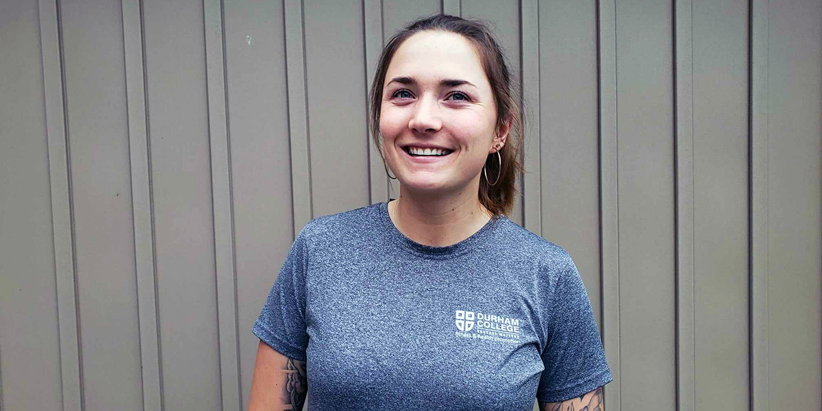 A profile photo of Melissa Lenis wearing a Durham College T-shirt.